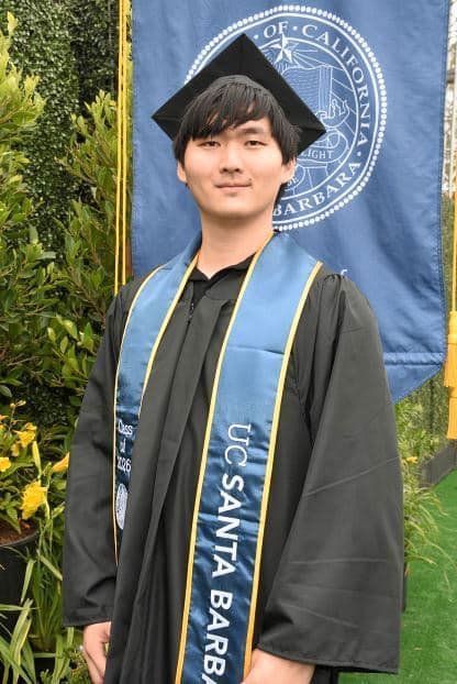 Junjie Liu in graduation regalia at UC Santa Barbara