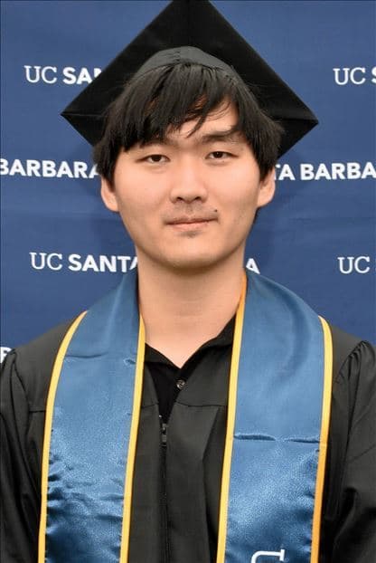 Portrait of Junjie Liu in UC Santa Barbara graduation regalia
